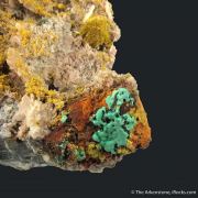 Tsumcorite (TL) on Tennantite and Quartz