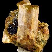 Apatite, hematite, quartz and actinolite pseudo. after pyroxene