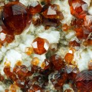 Garnet var. Spessartine and Quartz