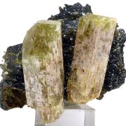 Apatite, hematite, quartz and actinolite pseudo. after pyroxene