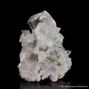 Calcite on Quartz var. Amethyst ps. Calcite