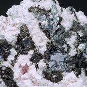 Nagyágite on Rhodochrosite