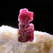 Corundum (var: Ruby) on Calcite