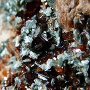 Grossular, var. Hessonite with Diopside and Chlorite