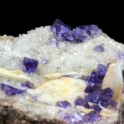 Fluorite + Baryte + Quartz.