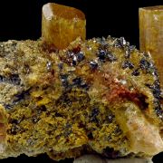 Apatite, hematite, quartz and actinolite pseudo. after pyroxene