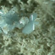 Vauxite, Paravauxite, Metavauxite, Sigloite, Quartz, Wavellite and Römerite/Locality - Siglo XX Mine, Bolivia (TYPE LOCALITY - four species)