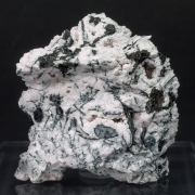 Nagyágite on Rhodochrosite