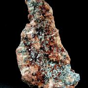 Grossular, var. Hessonite with Diopside and Chlorite