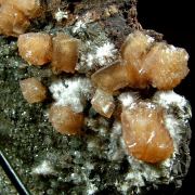 Olmiite with Bultfonteinite