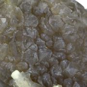 Chalcedony on Smoky Quartz “casts” after Laumontite