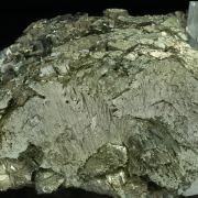 Arsenopyrite-Marcasite with Quartz with inclusions and Muscovite