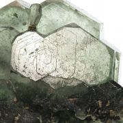 Fluorapatite with Actinolite (var: Byssolite) inclusions