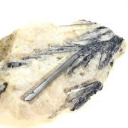 Stibnite + Calcite.