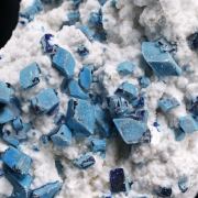 Henmilite coated by Calcite and on Olshanskyite