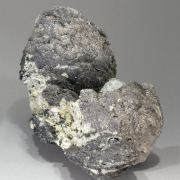Löllingite with Magnetite and Calcite