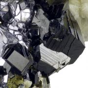 Pyrite pseudo. after pyrrhotite, siderite, galena, sphalerite