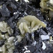 Pyrite “horseshoe” with Siderite on Sphalerite