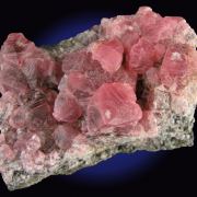 Rhodochrosite on matrix