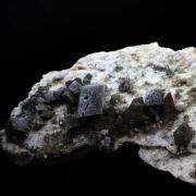 Titanite (Sphene) + Calcite.