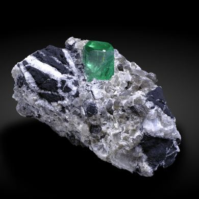 Beryl (variety emerald) on Calcite