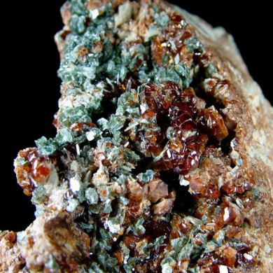 Grossular, var. Hessonite with Diopside and Chlorite