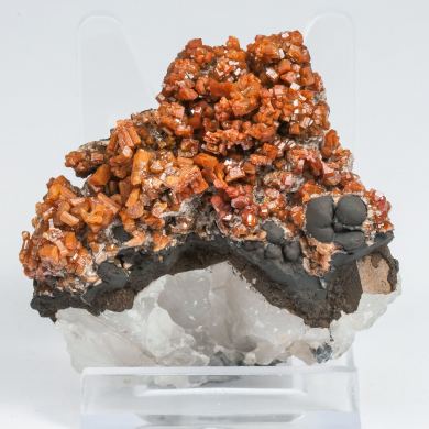 Vanadinite with manganese oxides and Quartz