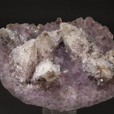 Calcite on Quartz (variety amethyst) and Hematite