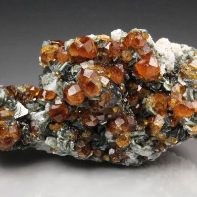 gem GARNET var. SPESSARTINE, MUSCOVITE