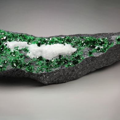 GARNET var. UVAROVITE, CALCITE