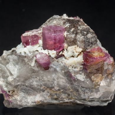 Elbaite-Schorl Series (variety rubellite) with Quartz and Feldspar