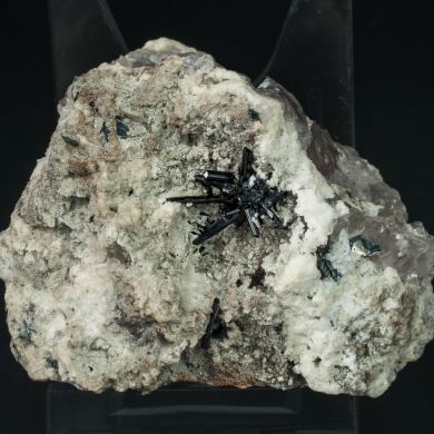 Tourmaline (Group) with Hematite (variety iron rose), Quartz and Feldspar