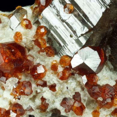 Garnet var. Spessartine and Quartz