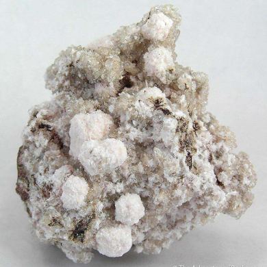 Oyelite on Calcite