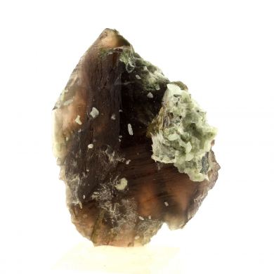 Axinite + Albite + Clinozoisite + Asbestos.