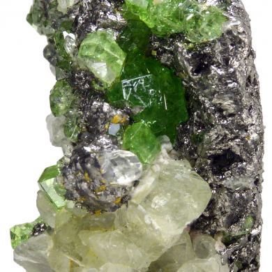 Grossular var. tsavorite, diopside, graphite